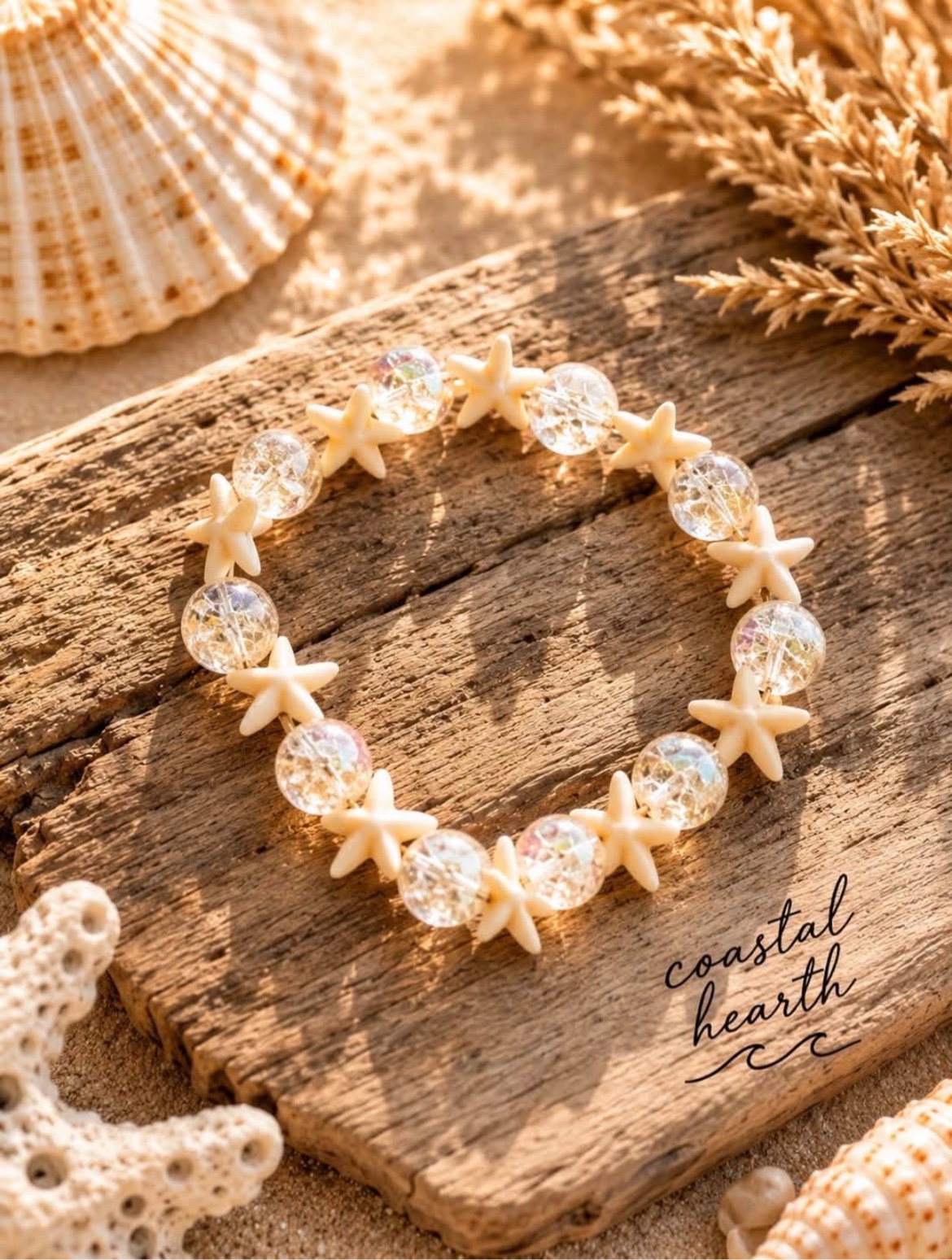 Crystal and starfish charm bracelet on driftwood